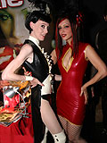 Party women in rubber and latex outfits.